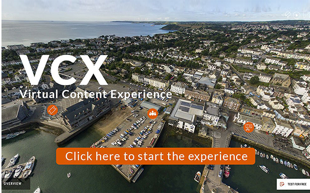 birds eye view of a town with VCX logo