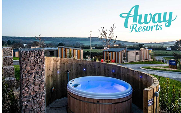 Hot tub shown outside with away resorts logo